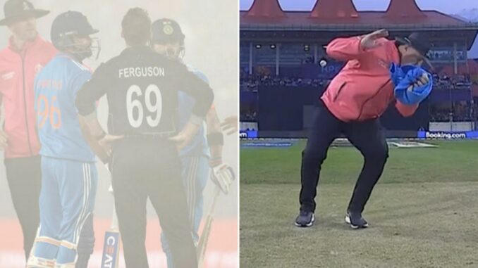 World-Cup-umpire-almost-has-head-knocked-off-before-match-is-halted-by-fog.jpg